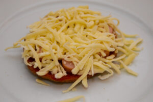 Bagel pizza with cheese on top